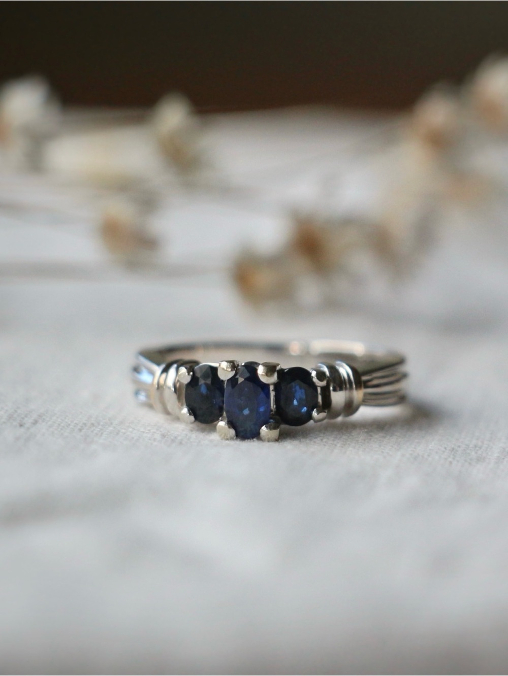 2000's Sapphire and 10k White Gold Trilogy Ring